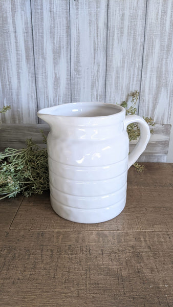 white ceramic farmhouse pitcher