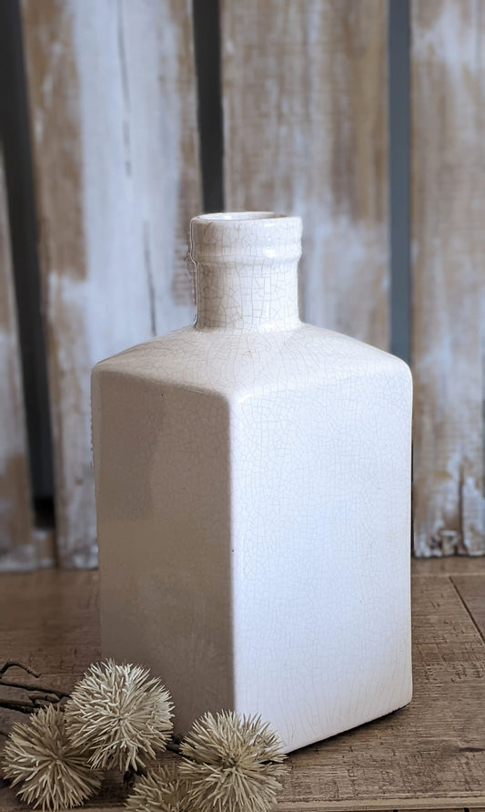 white ceramic square bottle vase