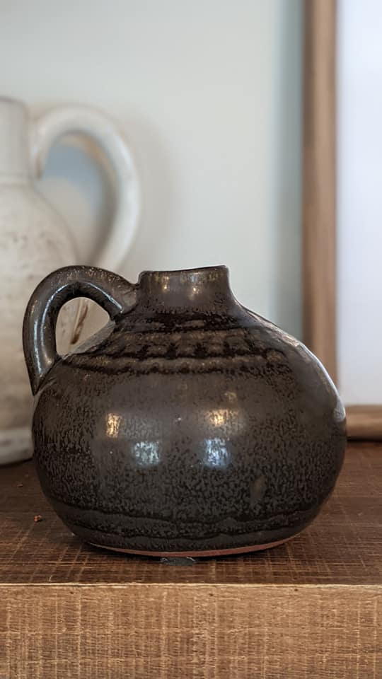 porcelain brown jug with handle