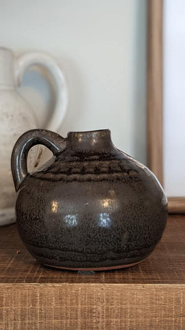 porcelain brown jug with handle