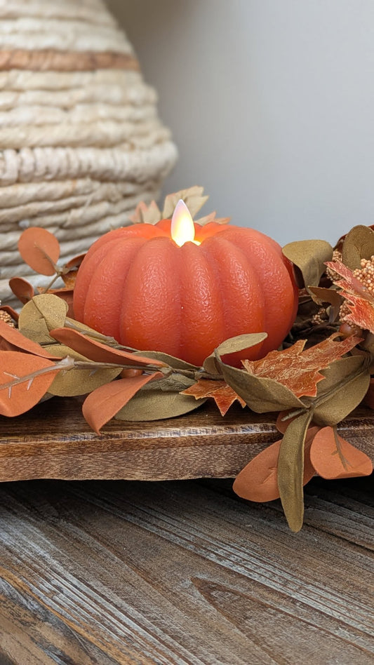 pumpkin candle with moving wick