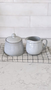 gray ceramic sugar and creamer set