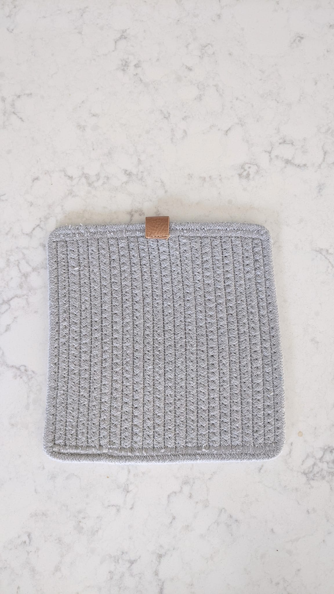 gray woven hot pad