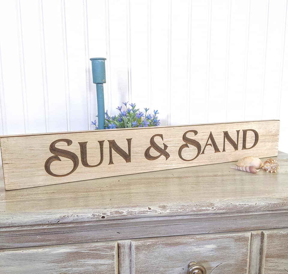 Sun and Sand Sign